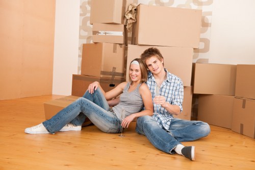 Student removals team loading boxes for a move in Wembley