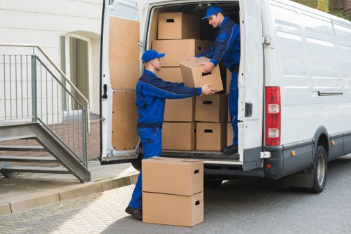 Careful loading of commercial items into a removal van in Wembley