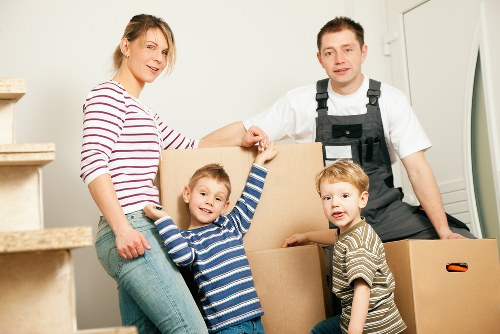 Professional movers handling furniture during a Wembley relocation