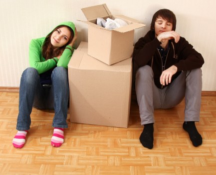 Packed boxes and furniture ready for loading during a Wembley home move