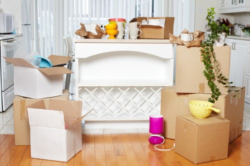 Carefully packed household items prepared for transport in Wembley