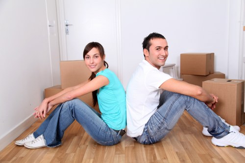 Professional movers handling furniture during a Wembley house relocation